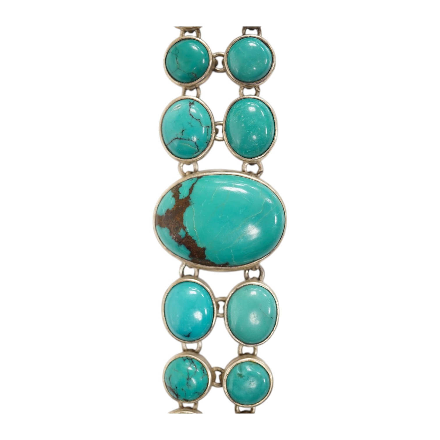 A modern silver and two row turquoise cluster set bracelet, overall 22cm. Condition - good